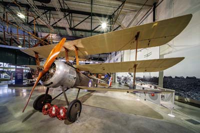 A vintage war aircraft from the Cavanaugh Flight Museum lands at